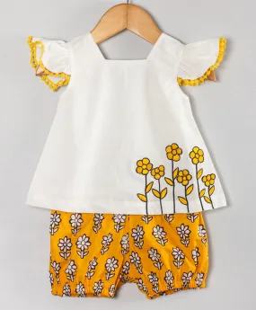 Infant coordinate set with embroidered flowers on the top n floral print shorts-White/ Yellow